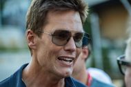 Tom brady arrives at his statue unveiling ceremony in Foxborough - (Image via Getty)